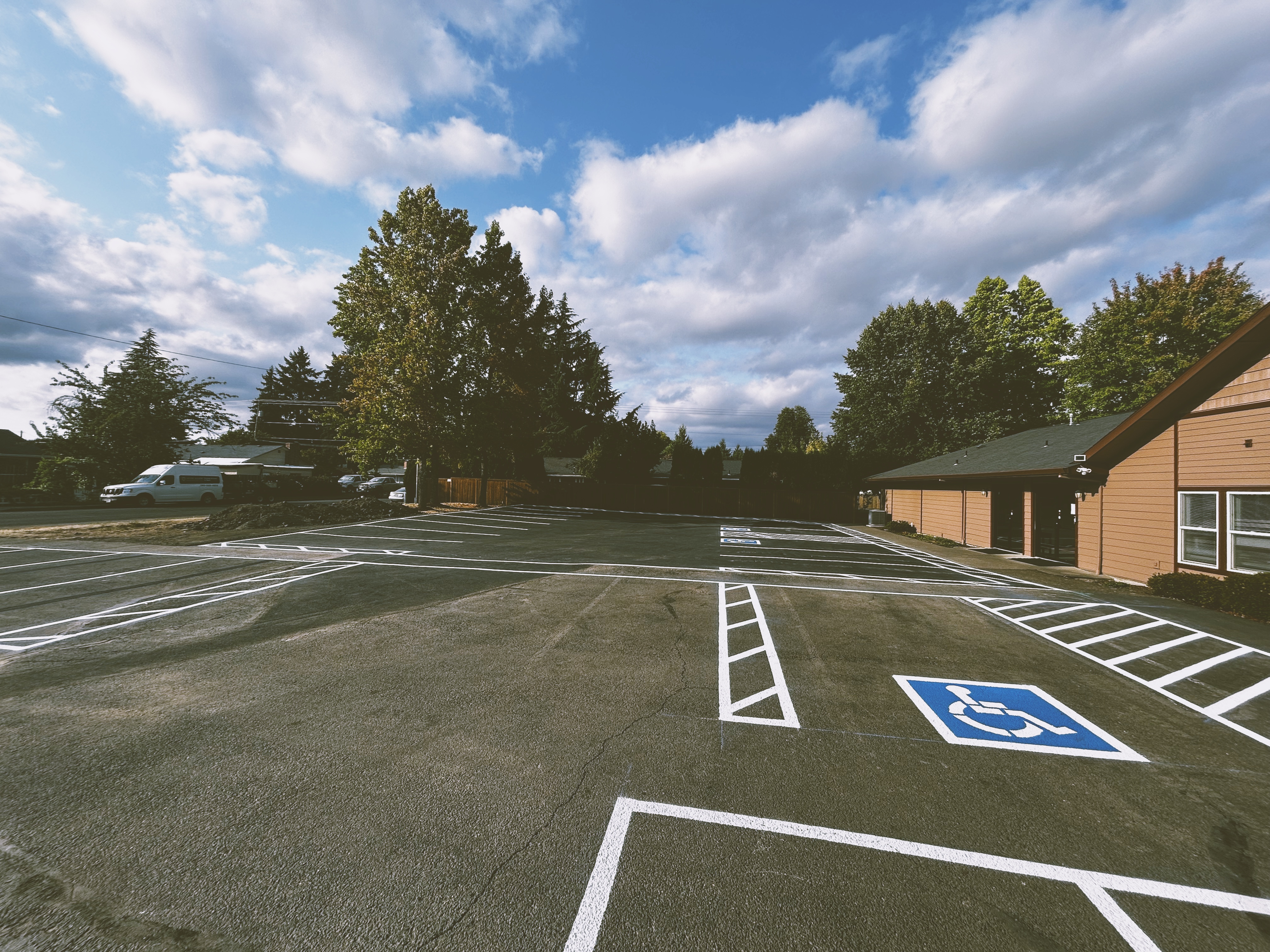 The parking lot at Valley Baptist Church in McMinnville, Oregon, with clearly marked spaces and an accessible entrance